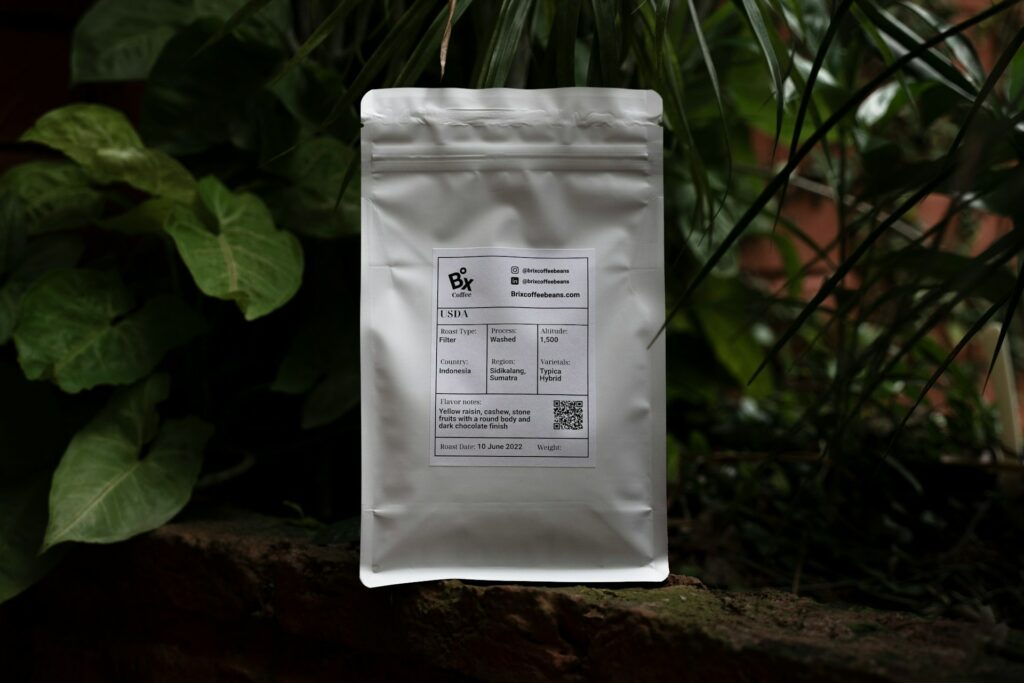 Fresh whole coffee beans with roast date for better brewing