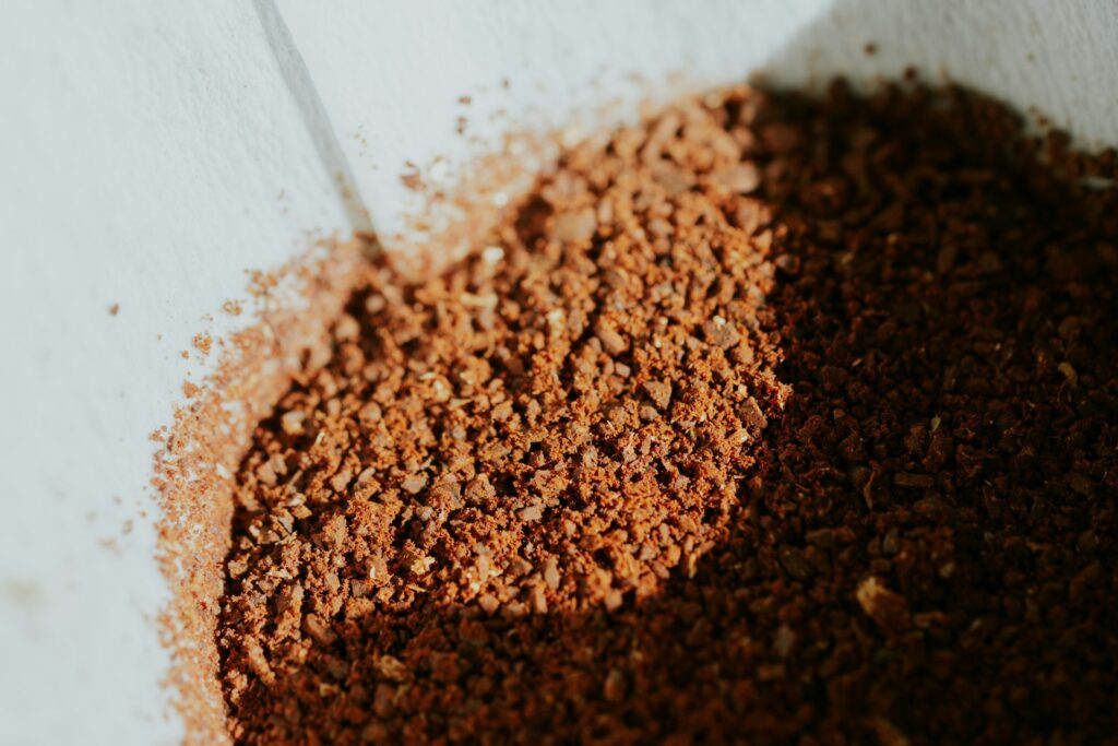 Uniform coffee grounds produced by a conical burr grinder