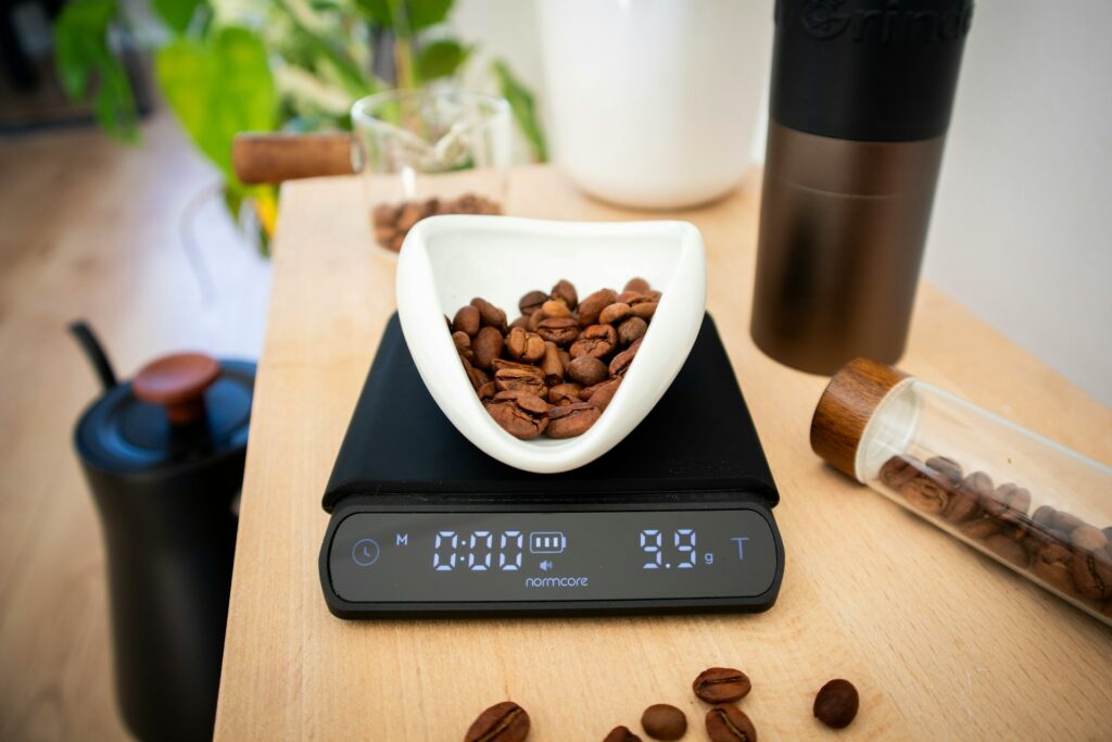 Budget coffee brewing equipment including grinder, scale, and brewer