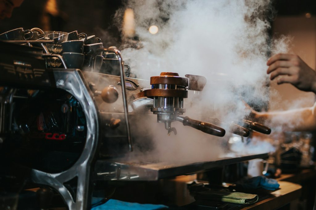 Espresso machine group head showing water distribution